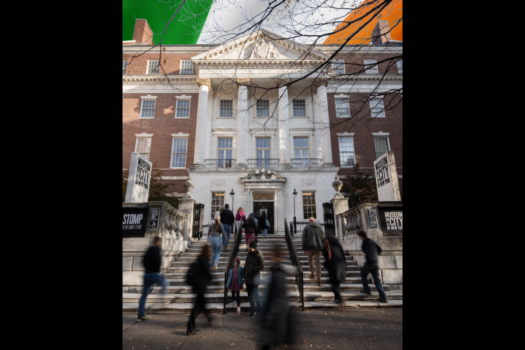 Visitors walking up the front steps of the Museum of the City of New York with flag of Ireland in background